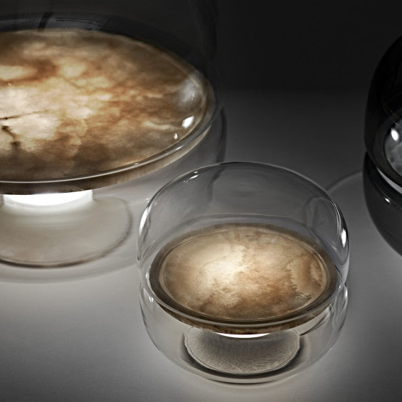 Macaron vloerlampen van Brokis met Onyx natuursteen tussenlaag